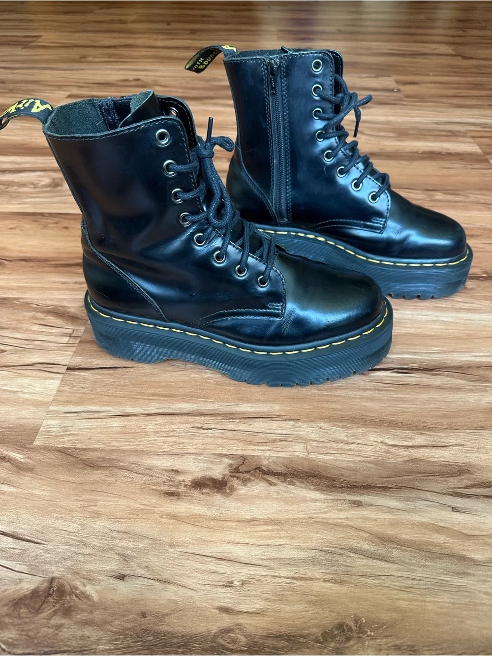 Dr. Martens Black Leather Platform Combat Boots with Yellow Stitching